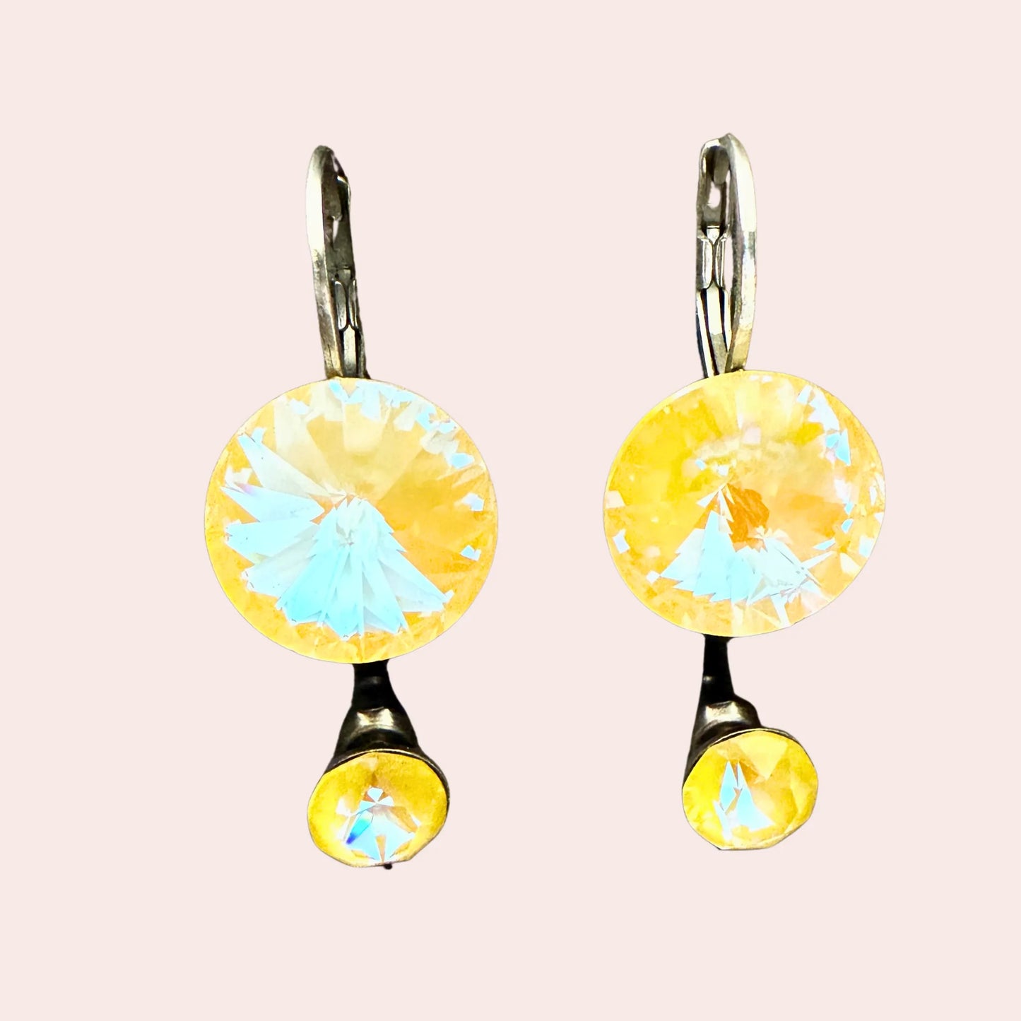 2 par sølv øredobber med yellow Swarovski krystaller