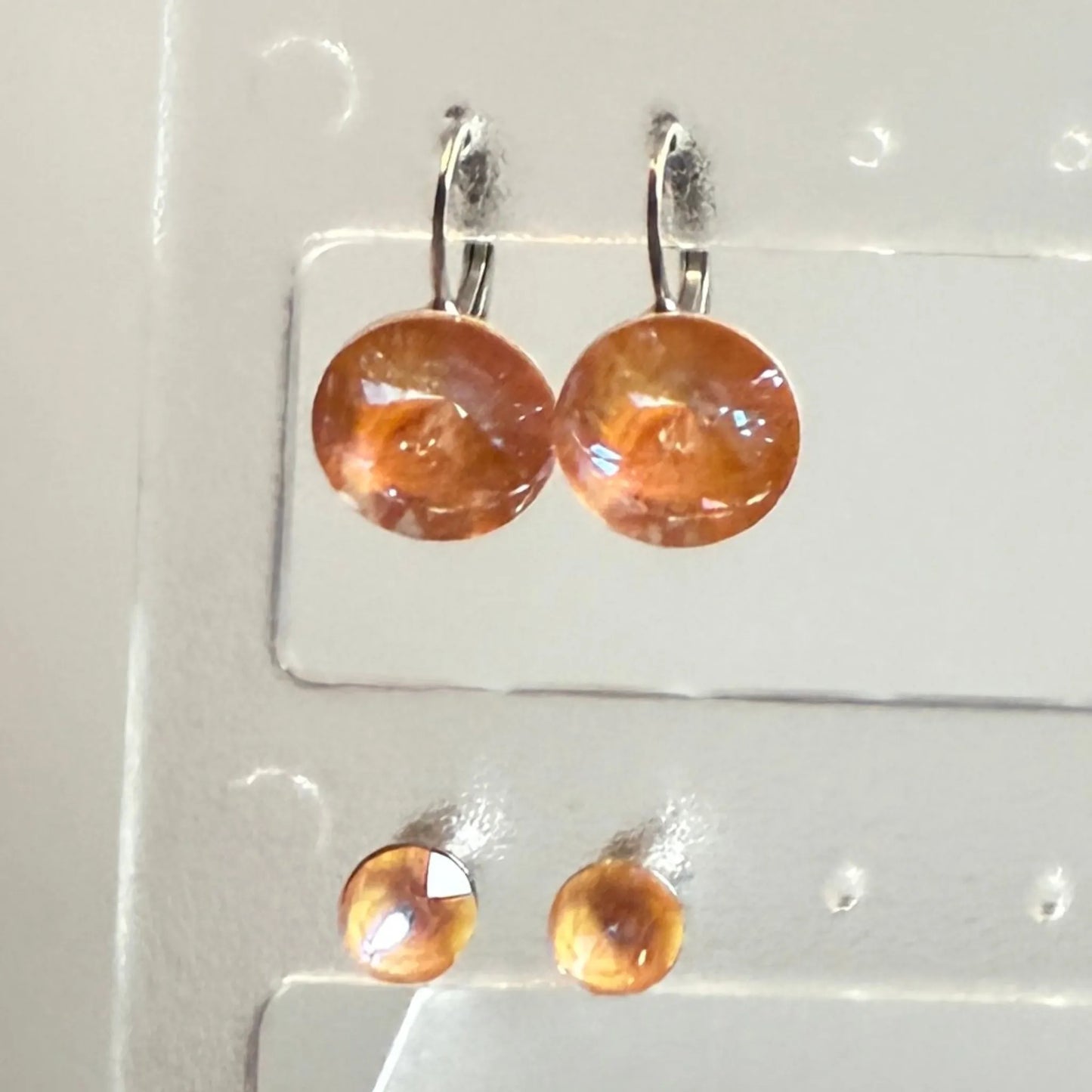 2 par sølv øredobber med ocher Swarovski krystaller