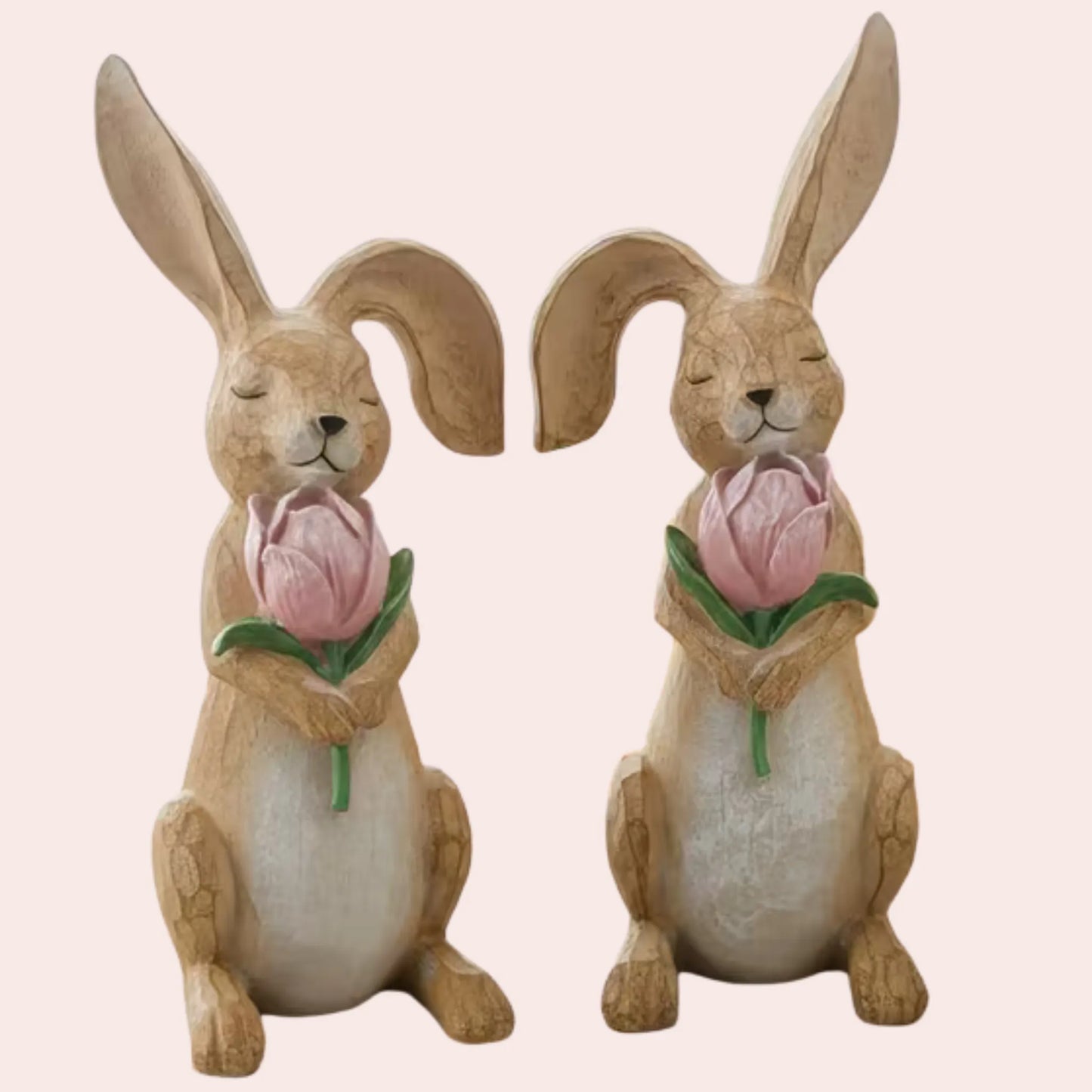 2 kaniner med rosa tulipaner