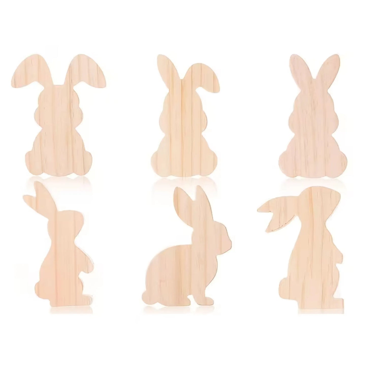 6 kaniner i tre