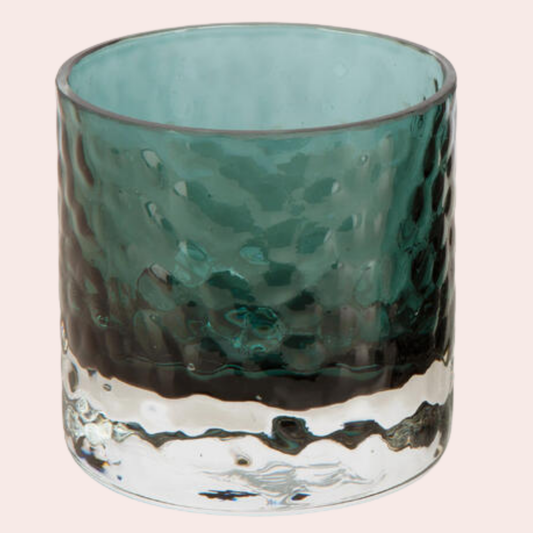 Liten petrolfarget telysholder i bølget glass