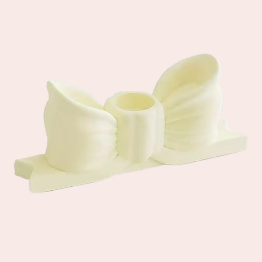 Gul sløyfe lysestake for kronelys i nydelige pastellfarger