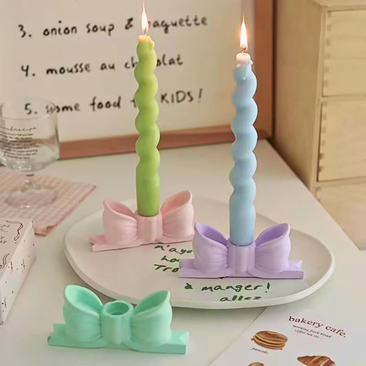 Grønn sløyfe lysestake for kronelys i nydelige pastellfarger