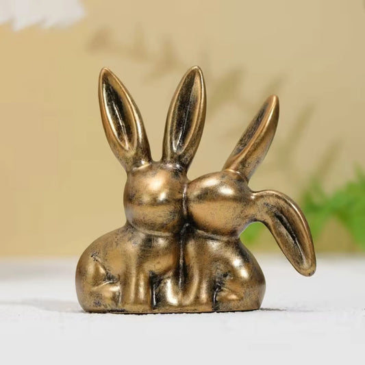 Kjærlighetskaniner i messing